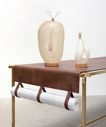 Leather table: Discarded Fendi leather, brass structure, marble weights 