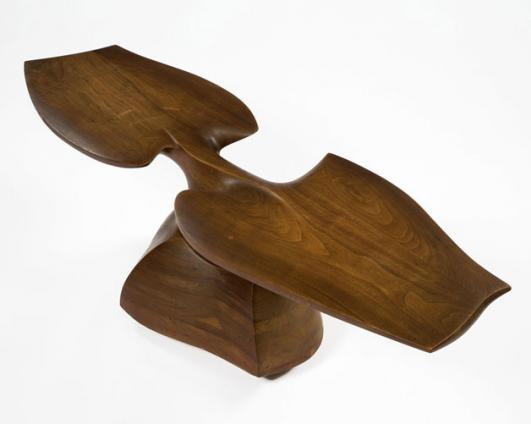 Unique sculptural coffee table in stack-laminated walnut. Designed and made by Wendell Castle, Rochester, New York, 1966. Signed and dated, "WC 66."
