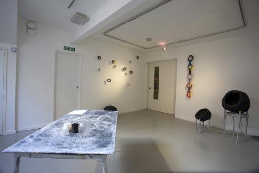  Silo Studio, installation view, NSEPS and Aluminium Table to foreground (2012), photo © Philip Sayer courtesy of Marsden Woo Gallery